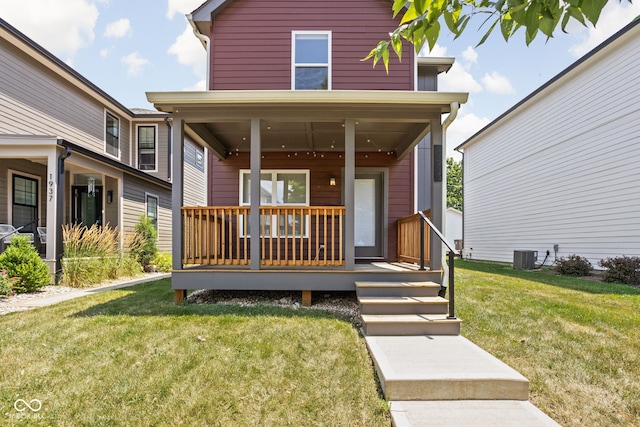 1935 Cornell Ave, Indianapolis, IN 46202 - view of front of house featuring a porch and a front lawn