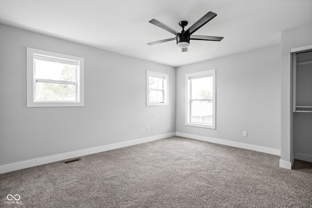 1935 Cornell Ave, Indianapolis, IN 46202 - unfurnished bedroom featuring carpet floors, a closet, and ceiling fan