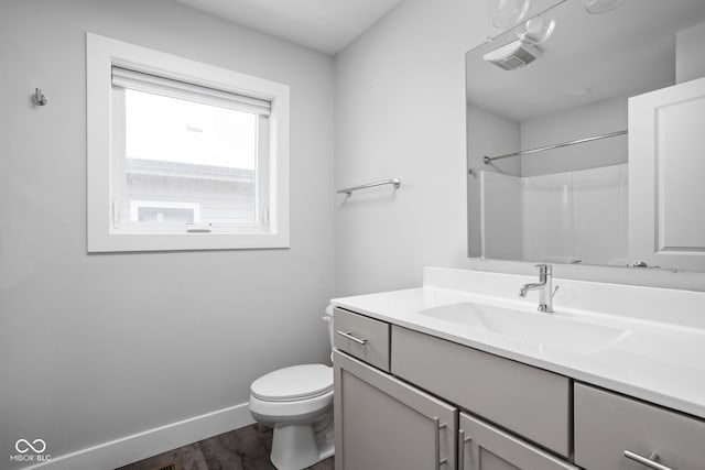 1935 Cornell Ave, Indianapolis, IN 46202 - full bathroom featuring vanity, wood finished floors, and a shower