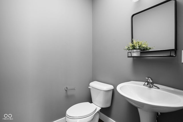 1935 Cornell Ave, Indianapolis, IN 46202 - bathroom with baseboards and toilet