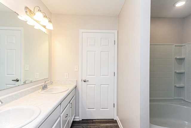 990 Constellation Way, Franklin, IN 46131 - bathroom featuring double vanity, wood finished floors, and  shower combination