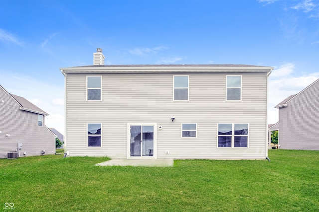 990 Constellation Way, Franklin, IN 46131 - back of property with a yard and a chimney
