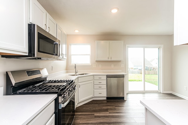990 Constellation Way, Franklin, IN 46131 - kitchen featuring appliances with stainless steel finishes, white cabinets, dark wood-style floors, and recessed lighting