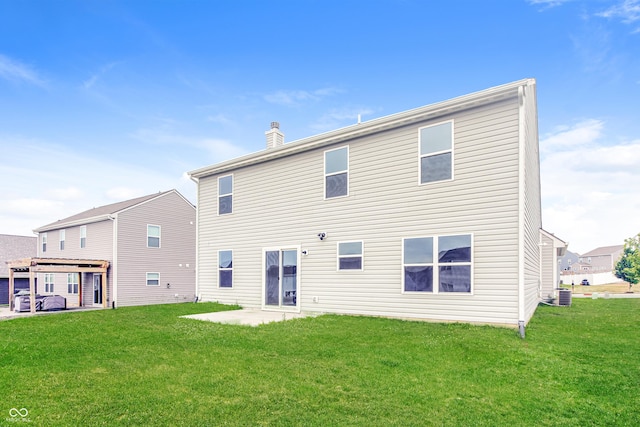 990 Constellation Way, Franklin, IN 46131 - rear view of property with a yard, a patio area, and a chimney