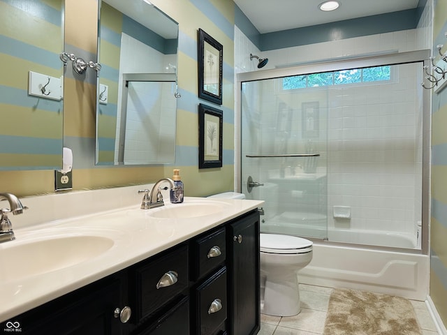 9975 Woodstock Way, Fishers, IN 46037 - full bath with double vanity, combined bath / shower with glass door, and tile patterned floors