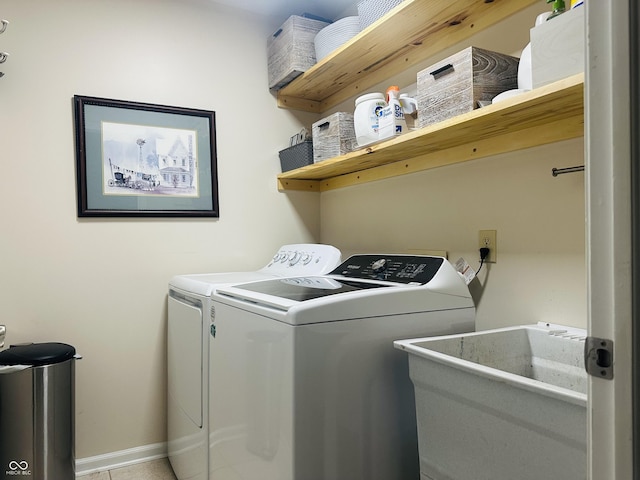 9975 Woodstock Way, Fishers, IN 46037 - washroom featuring independent washer and dryer and baseboards