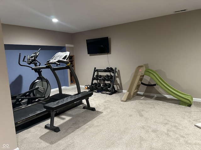 9975 Woodstock Way, Fishers, IN 46037 - workout room with baseboards and carpet floors