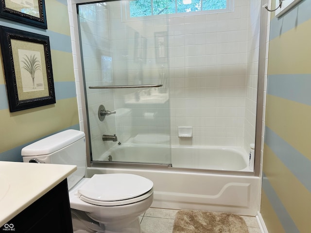 9975 Woodstock Way, Fishers, IN 46037 - full bathroom featuring vanity, bath / shower combo with glass door, and tile patterned floors