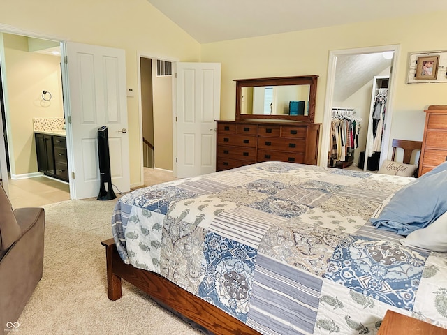 9975 Woodstock Way, Fishers, IN 46037 - bedroom featuring lofted ceiling, a spacious closet, carpet flooring, and connected bathroom