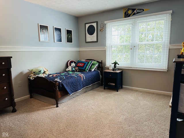 9975 Woodstock Way, Fishers, IN 46037 - bedroom featuring carpet and a textured ceiling