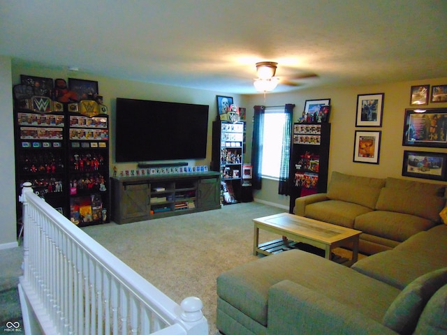 2703 Night Hawk Rd, Greenwood, IN 46143 - carpeted living room with baseboards and ceiling fan