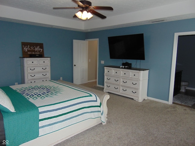 2703 Night Hawk Rd, Greenwood, IN 46143 - bedroom with carpet floors, ensuite bath, and ceiling fan