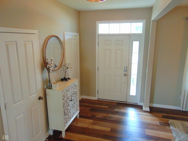 2703 Night Hawk Rd, Greenwood, IN 46143 - entrance foyer featuring wood finished floors and baseboards