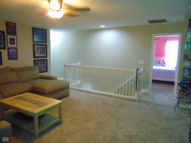 2703 Night Hawk Rd, Greenwood, IN 46143 - carpeted living area featuring a ceiling fan and baseboards