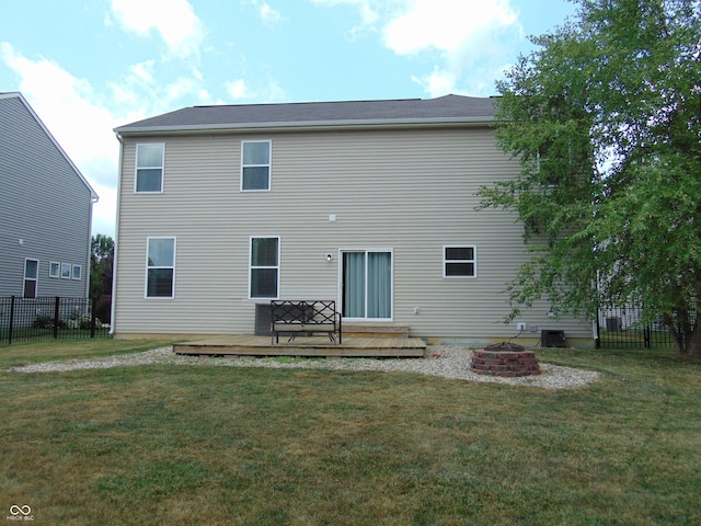 2703 Night Hawk Rd, Greenwood, IN 46143 - back of property with a fire pit and a deck