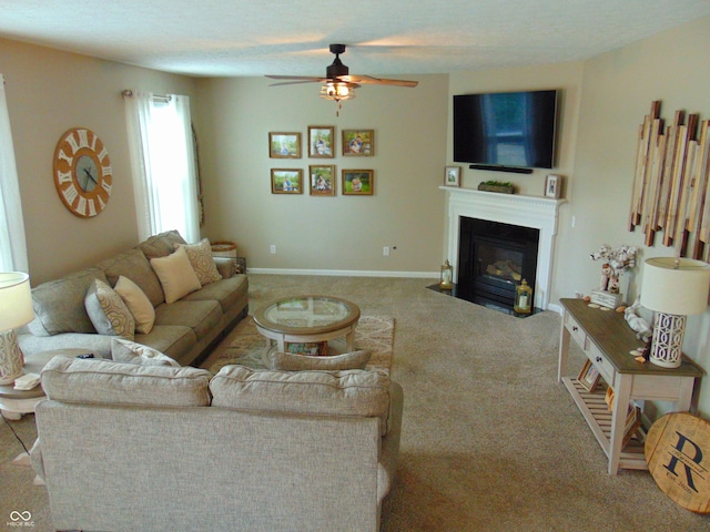2703 Night Hawk Rd, Greenwood, IN 46143 - living area featuring ceiling fan, carpet floors, and a fireplace with flush hearth