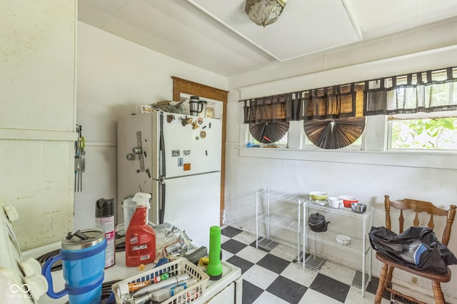 913 S Hall St, Princeton, IN 47670 - kitchen with freestanding refrigerator and tile patterned floors