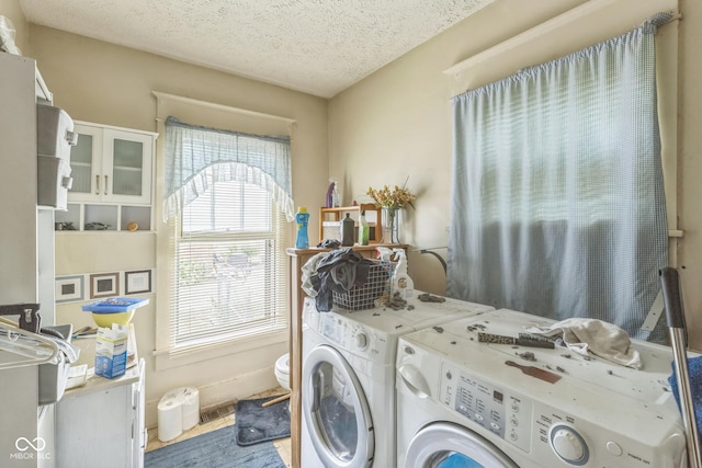 913 S Hall St, Princeton, IN 47670 - laundry room featuring separate washer and dryer and a textured ceiling