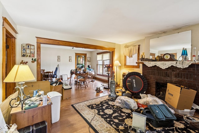913 S Hall St, Princeton, IN 47670 - living area featuring wood finished floors and a brick fireplace