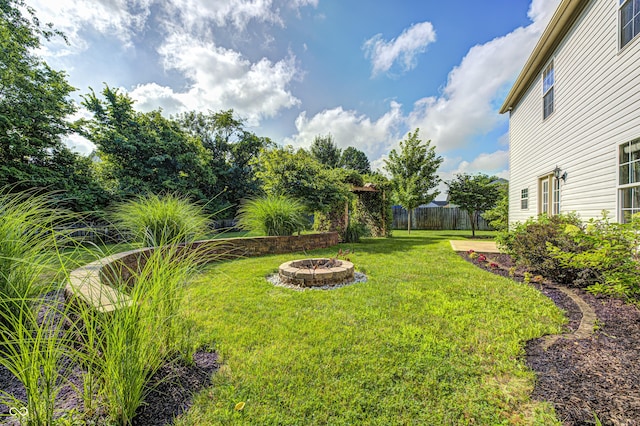 1143 Kinross Dr, Avon, IN 46123 - view of yard with an outdoor fire pit