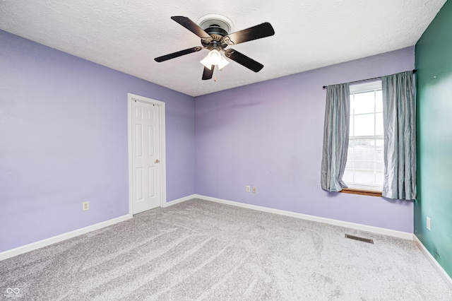 1143 Kinross Dr, Avon, IN 46123 - unfurnished room with carpet flooring, ceiling fan, and a textured ceiling