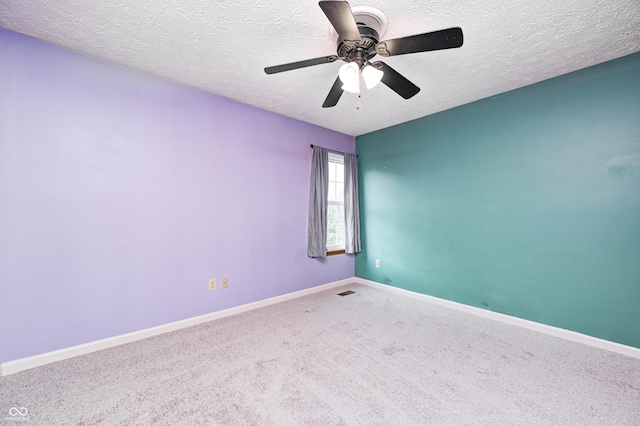 1143 Kinross Dr, Avon, IN 46123 - empty room with carpet, ceiling fan, and a textured ceiling