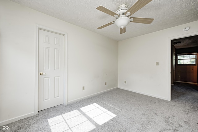 1143 Kinross Dr, Avon, IN 46123 - carpeted empty room with ceiling fan and a textured ceiling