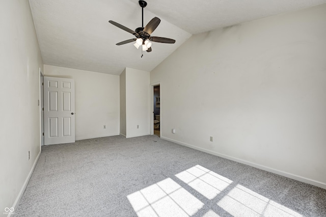 1143 Kinross Dr, Avon, IN 46123 - unfurnished bedroom featuring light colored carpet, lofted ceiling, and a ceiling fan
