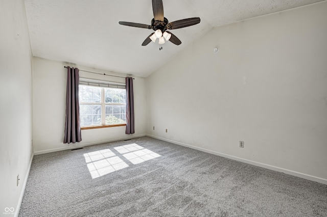 1143 Kinross Dr, Avon, IN 46123 - unfurnished room with a ceiling fan, carpet flooring, vaulted ceiling, and a textured ceiling