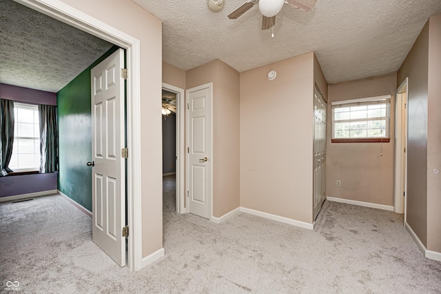 1143 Kinross Dr, Avon, IN 46123 - corridor with carpet floors and a textured ceiling