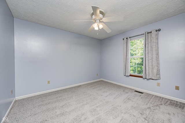 1143 Kinross Dr, Avon, IN 46123 - spare room featuring ceiling fan, carpet, and a textured ceiling