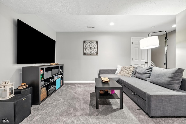 8612 Weaver Woods Pl, Fishers, IN 46038 - carpeted living area with a textured ceiling and recessed lighting
