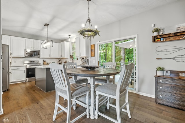 8612 Weaver Woods Pl, Fishers, IN 46038 - dining space with dark wood-type flooring and a chandelier
