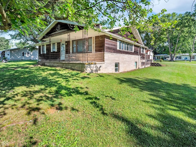 4484 S County Road 315 W, Greencastle, IN 46135 - view of front of property featuring a porch, a front yard, and brick siding
