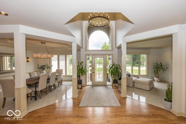 13023 Water Ridge Dr, Mccordsville, IN 46055 - foyer entrance featuring a chandelier and wood finished floors