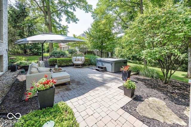 13023 Water Ridge Dr, Mccordsville, IN 46055 - view of patio / terrace with a hot tub and an outdoor living space