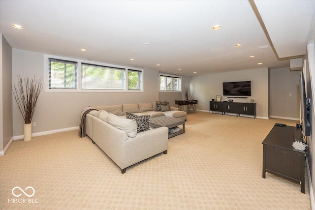 13023 Water Ridge Dr, Mccordsville, IN 46055 - living area with light colored carpet, recessed lighting, and healthy amount of natural light