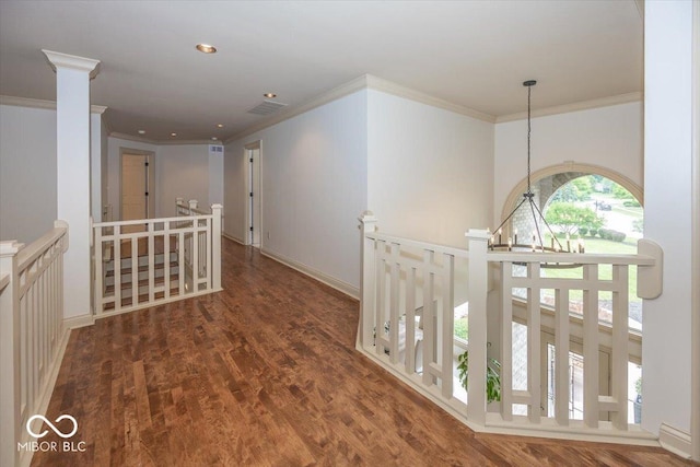 13023 Water Ridge Dr, Mccordsville, IN 46055 - hall with an upstairs landing, ornamental molding, wood finished floors, a chandelier, and recessed lighting