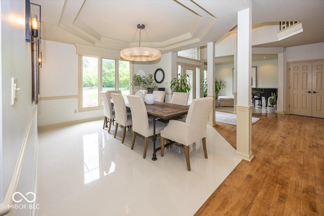 13023 Water Ridge Dr, Mccordsville, IN 46055 - dining area featuring a raised ceiling and crown molding