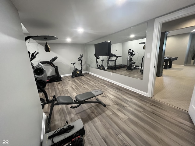 13023 Water Ridge Dr, Mccordsville, IN 46055 - workout area featuring wood finished floors and recessed lighting