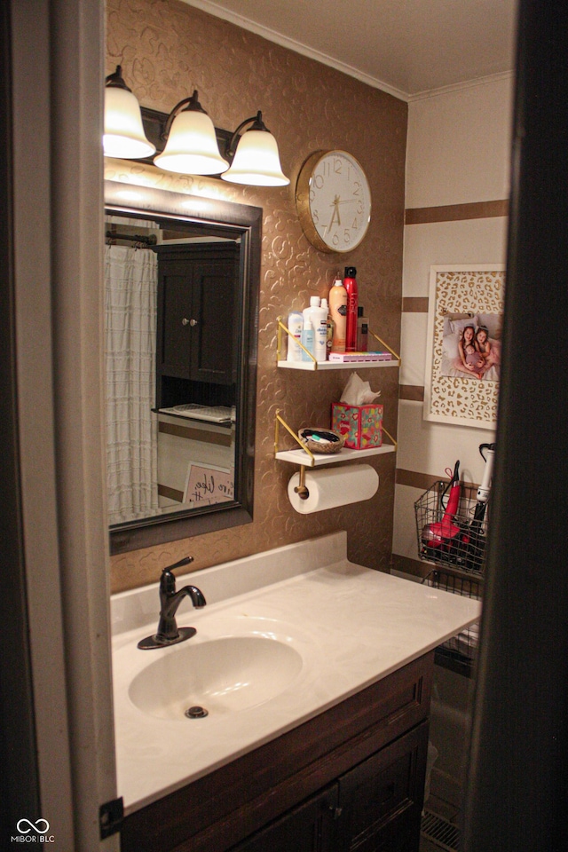 1042 S County Road 600 W, Danville, IN 46122 - bathroom with vanity, crown molding, and wallpapered walls