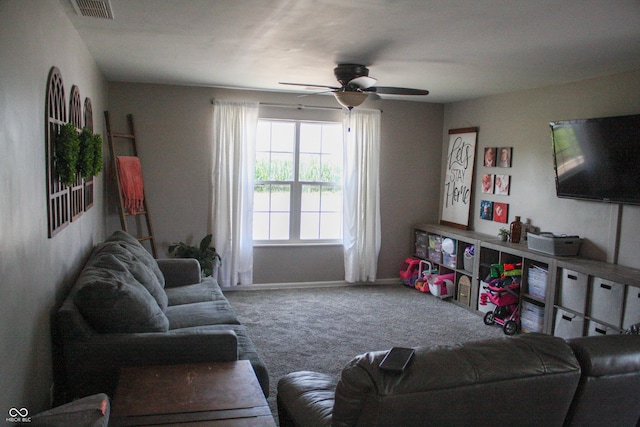 1042 S County Road 600 W, Danville, IN 46122 - carpeted living area featuring a ceiling fan and baseboards