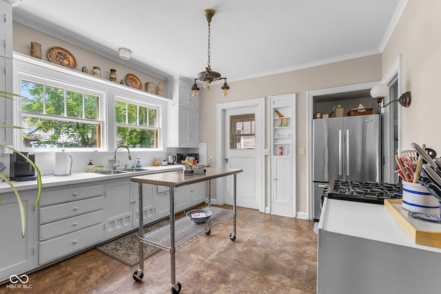 613 5th St, Columbus, IN 47201 - kitchen featuring ornamental molding, light countertops, tasteful backsplash, gray cabinets, and freestanding refrigerator