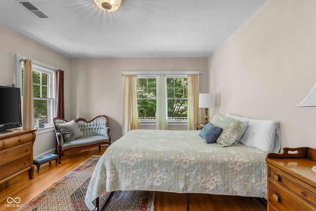 613 5th St, Columbus, IN 47201 - bedroom with wood finished floors