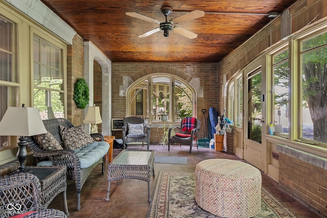 613 5th St, Columbus, IN 47201 - sunroom / solarium with brick wall, wood ceiling, french doors, and concrete floors