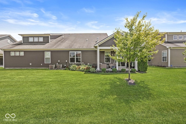 10868 Matherly Way, Noblesville, IN 46060 - back of house featuring a lawn, roof with shingles, and a patio area