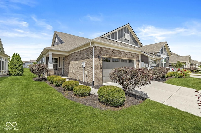 10868 Matherly Way, Noblesville, IN 46060 - view of home's exterior with a lawn, brick siding, roof with shingles, driveway, and a garage