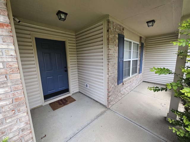 3838 Crest Point Dr, Westfield, IN 46062 - entrance to property featuring a porch and brick siding