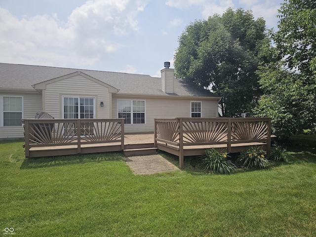 3838 Crest Point Dr, Westfield, IN 46062 - rear view of house with a wooden deck, a lawn, and a chimney