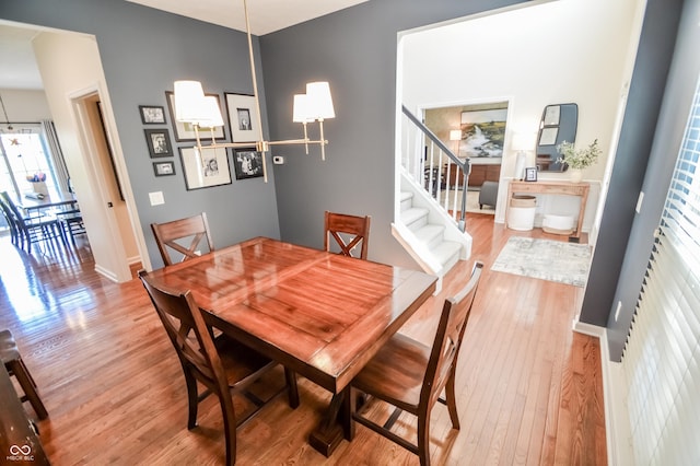 6802 Chorleywood Cir, Indianapolis, IN 46259 - dining room featuring wood finished floors and stairs